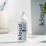 Close up picture of the Kloud Whitening Foam bottle.