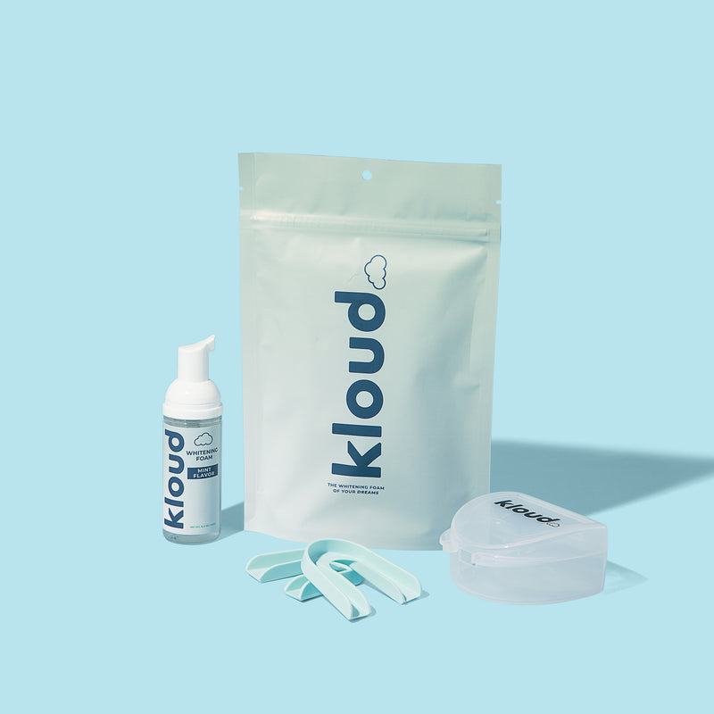The Kloud Whitening Foam Kit contains Whitening Foam, trays, and a storage case/