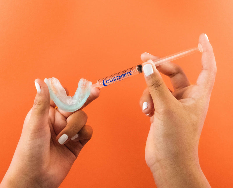 CustMbite makes whitening your teeth simple, with an easy-to-use syringe gel applicator. 